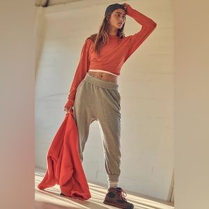 NWOT Free People Keep Rolling Solid Long Sleeve
- Maraschino